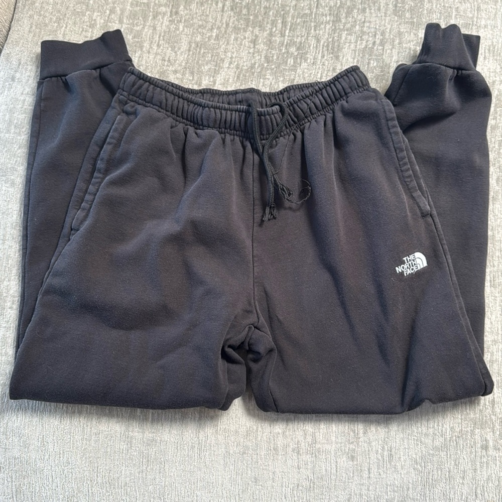 Men’s North face, black sweats size small